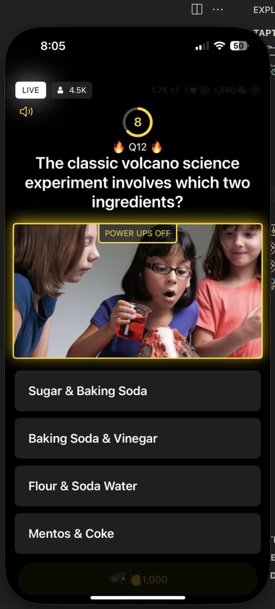 An iPhone screenshot displaying the trivia question "The classic volcano science experiment involves which two ingredients?" along with four answers: Sugar & Baking Soda, Baking Soda & Vinegar, Flour & Soda Water, and Mentos & Coke.